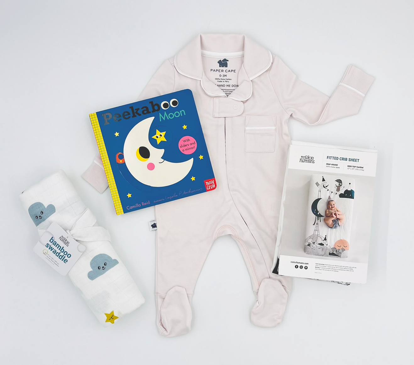 Peekaboo Moon, Pink Pajamas, Moon & Stars Swaddle, and Moon Crib Sheet